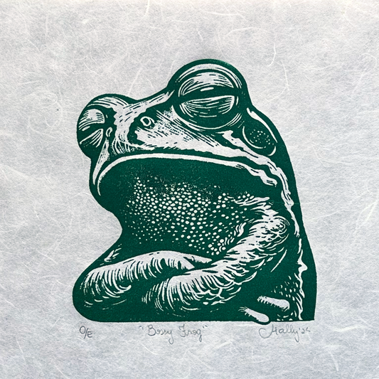 A green frog with its arms crossed and a sassy expression on its face. A perfect representation of moodiness—whether bossy, judgy, or just sassy.